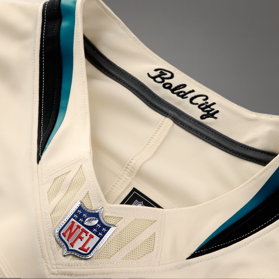 Men's Jacksonville Jaguars Travis Hunter Nike Natural 2026 Rivalries Collection Stitched Limited Jersey